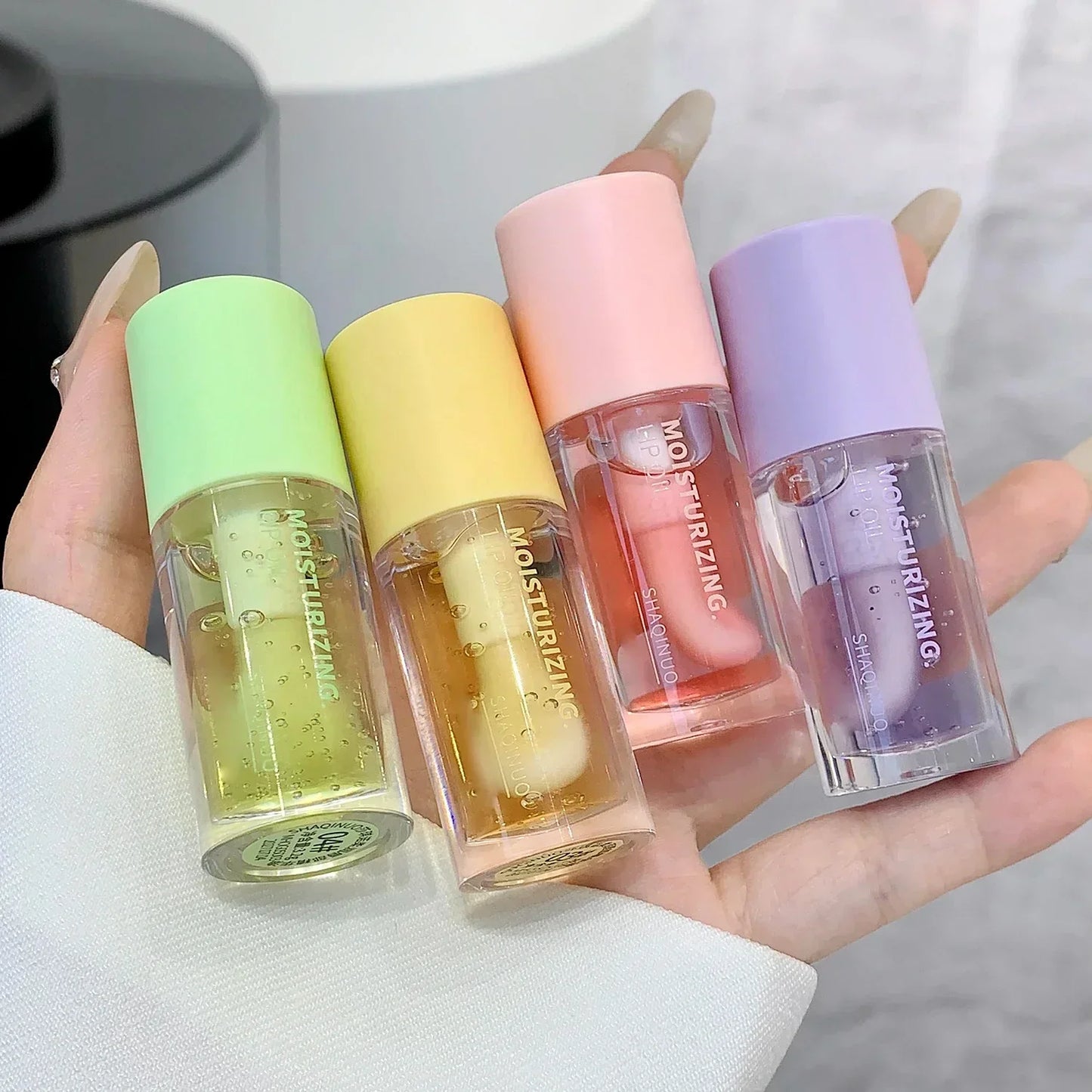 Crystal Clear Fruit Lip Oil: Moisturizing Gloss & Plumper